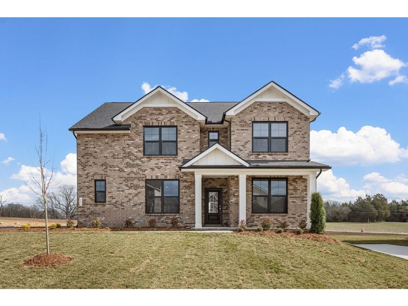 Front exterior of a new home in Benders Cove, Mount Juliet, TN, highlighting curb appeal (Image 1). Front exterior of a new home in Benders Cove, Mount Juliet, TN, highlighting curb appeal (Image 1).