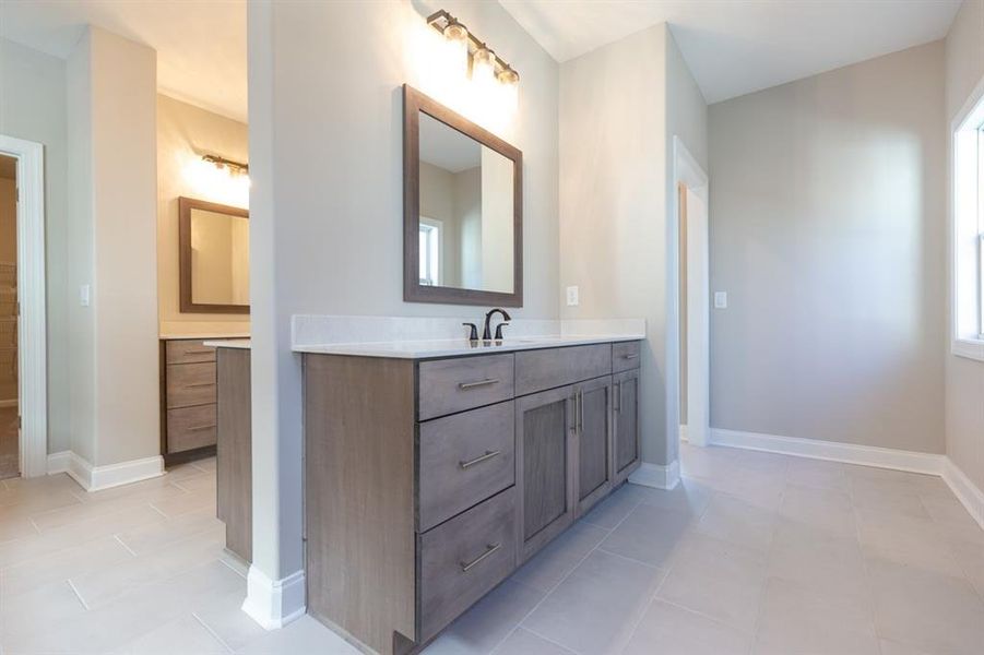 Furnished interior view inside a new home in Waterhaven, Cumming (Image 18).