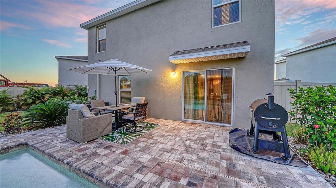 Exterior details and patio area of a home in Bella Lago, Parrish (Image 23).