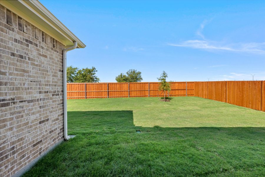 Exterior details and patio area of a home in Morningstar, Aledo (Image 32).