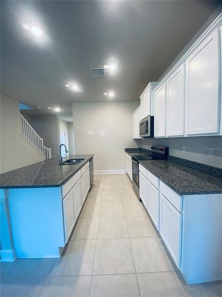 Furnished interior view inside a new home in , St. Cloud (Image 5).