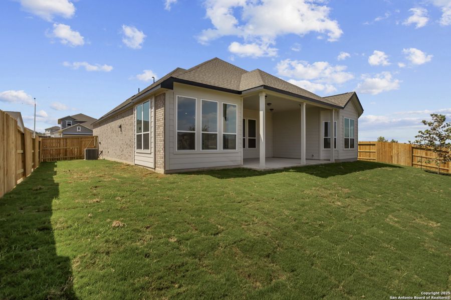 Exterior details and patio area of a home in Homestead 75', Schertz (Image 3).
