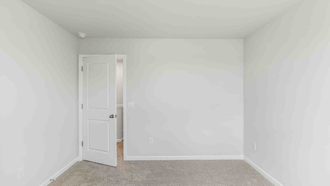 Spacious, unfurnished interior of a new home in Cedar Hill Landing, Navassa (Image 24). Spacious, unfurnished interior of a new home in Cedar Hill Landing, Navassa (Image 24).