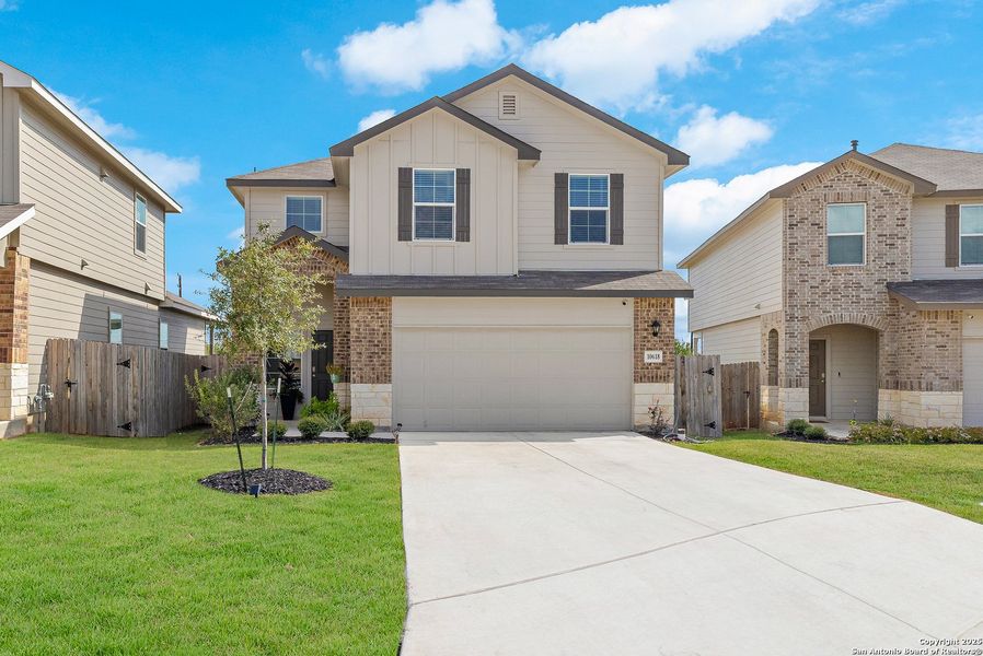 Front exterior of a new home in Applewood, San Antonio, TX, highlighting curb appeal (Image 1). Front exterior of a new home in Applewood, San Antonio, TX, highlighting curb appeal (Image 1).