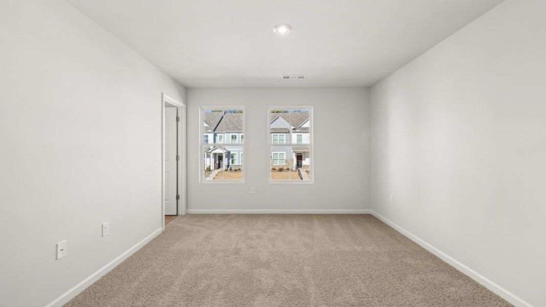 Spacious, unfurnished interior of a new home in Waypoint, Flowery Branch (Image 13).