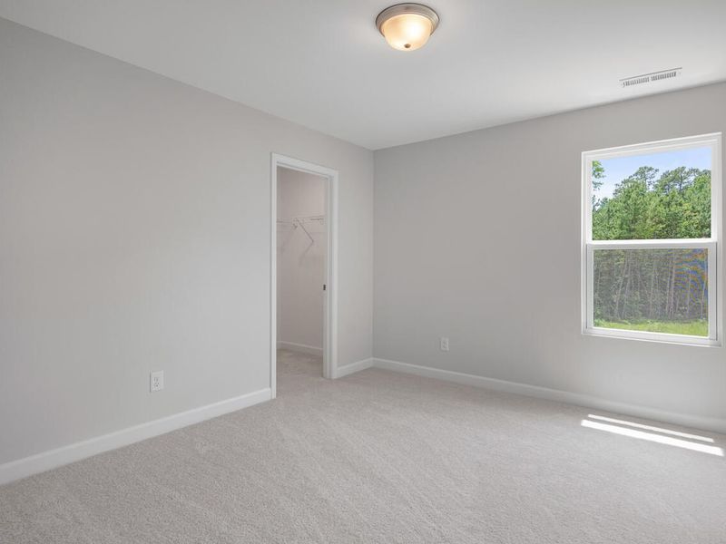 Spacious, unfurnished interior of a new home in Wellers Knoll, Lillington (Image 22).