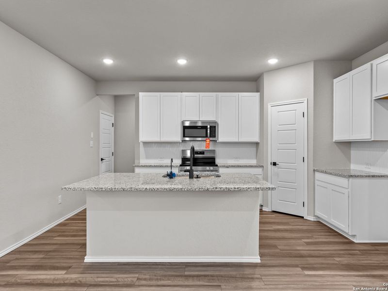 Furnished interior view inside a new home in Royal Crest, San Antonio (Image 5).