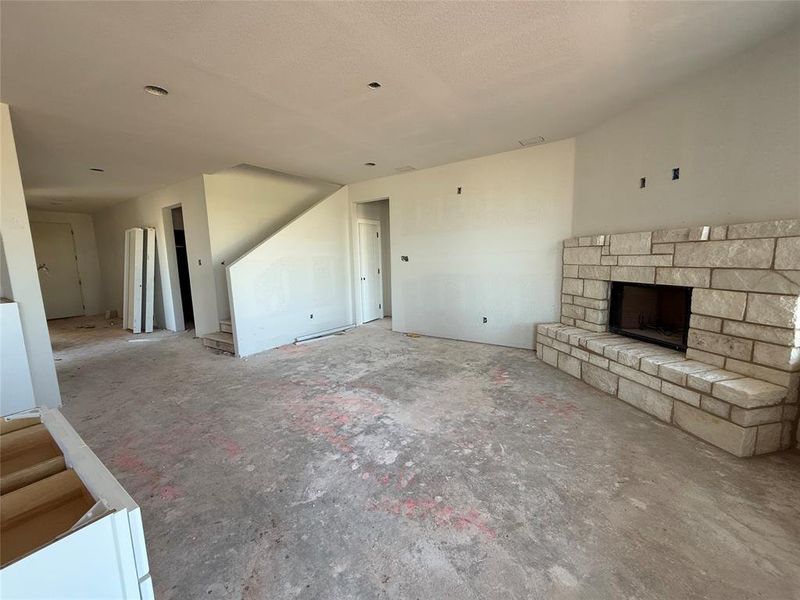 Unfurnished living room with a fireplace