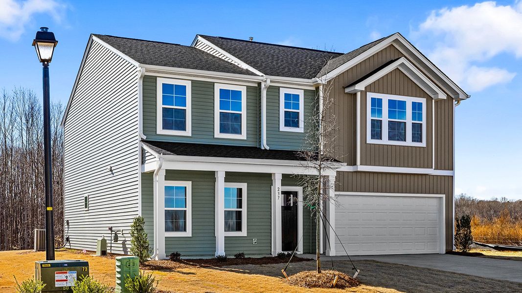 Front exterior of a new home in Fieldstone, Lexington, NC, highlighting curb appeal (Image 21).