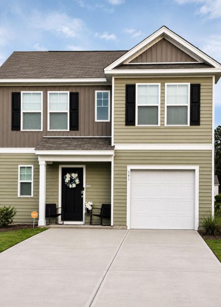 Front exterior of a new home in , Summerville, SC, highlighting curb appeal (Image 1). Front exterior of a new home in , Summerville, SC, highlighting curb appeal (Image 1).