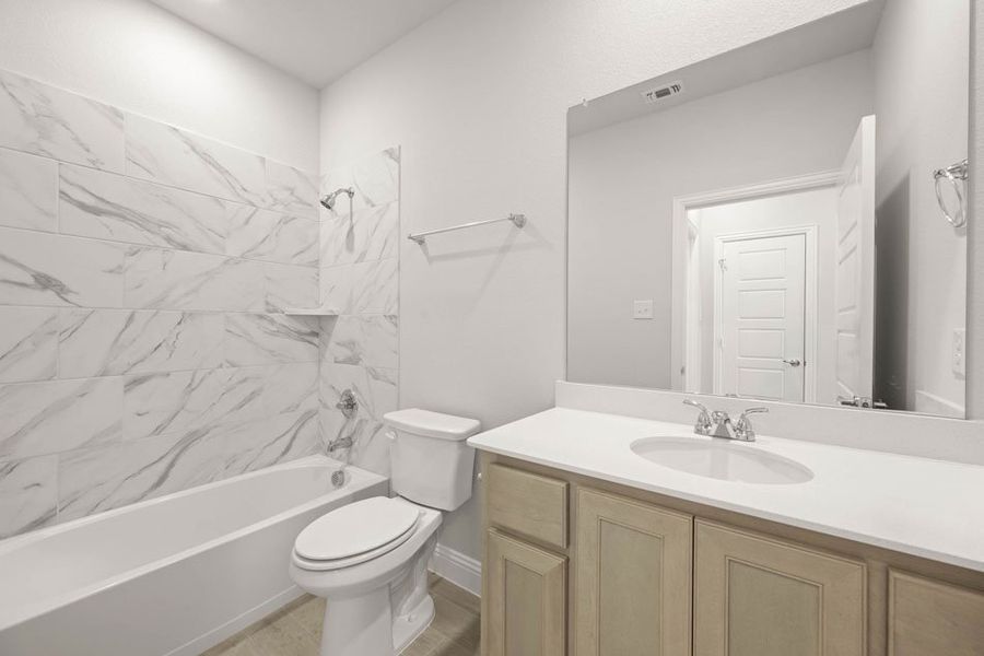 Front exterior of a new home in Redden Farms – Active Adult, Midlothian, TX, highlighting curb appeal (Image 14). Front exterior of a new home in Redden Farms – Active Adult, Midlothian, TX, highlighting curb appeal (Image 14).