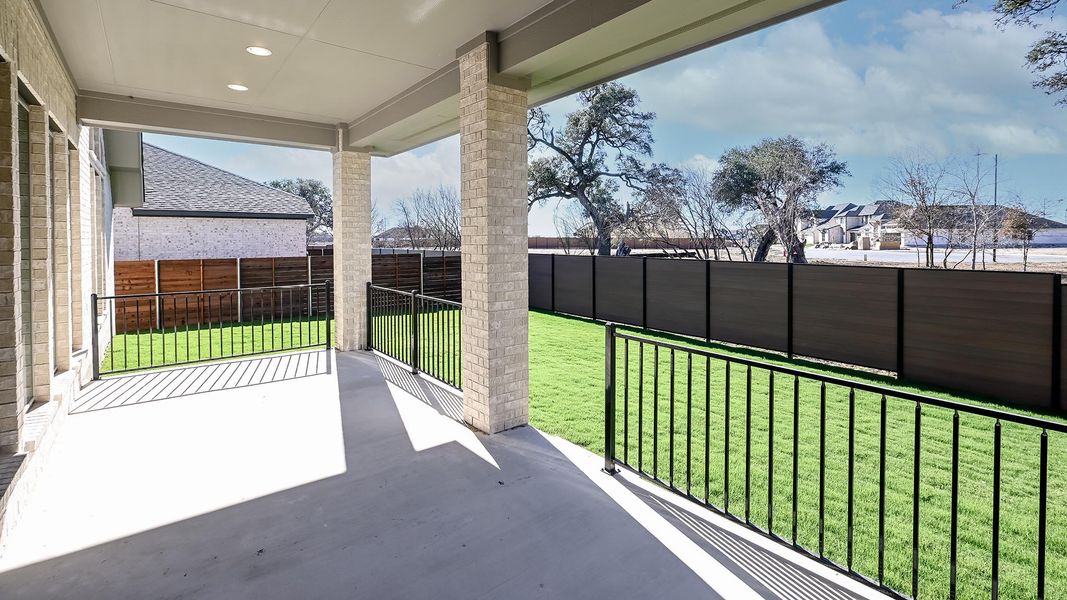 Exterior details and patio area of a home in Juniper Springs, Lockhart (Image 3).