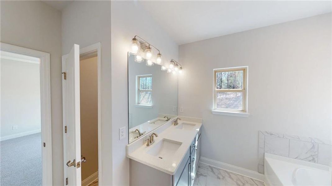 Furnished interior view inside a new home in Mirror Lake at South Harbour, Villa Rica (Image 7).