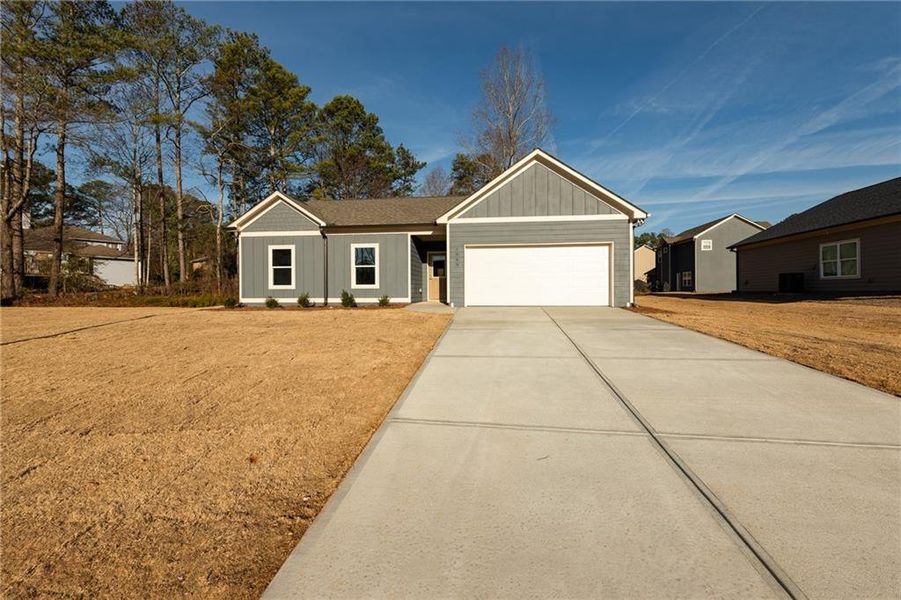 Front exterior of a new home in , Lawrenceville, GA, highlighting curb appeal (Image 17).