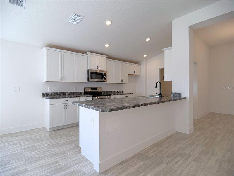 Furnished interior view inside a new home in , Ocala (Image 10). Furnished interior view inside a new home in , Ocala (Image 10).