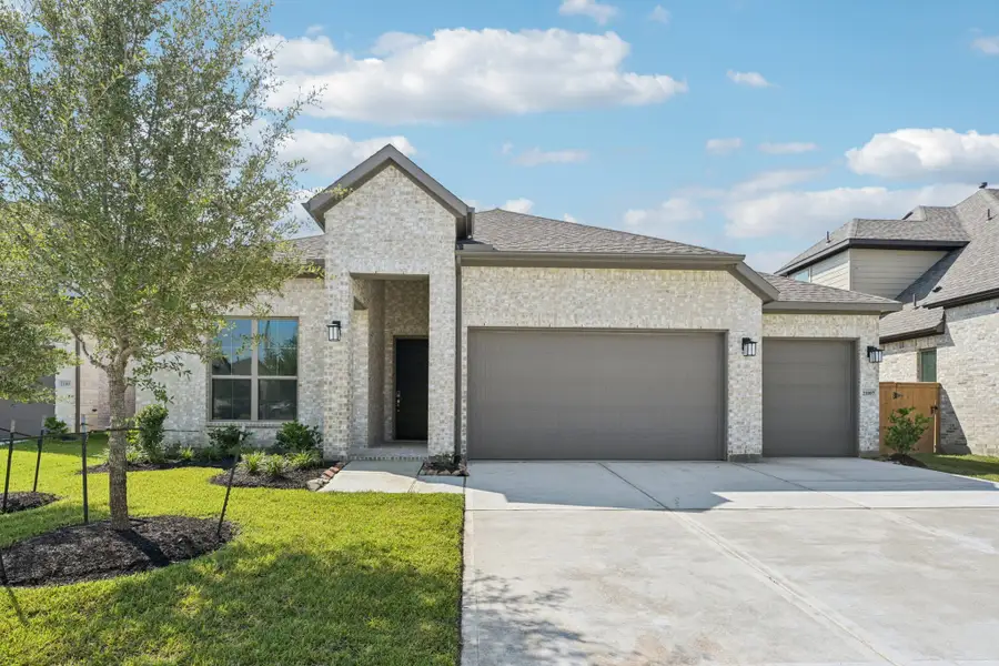 Representative exterior photo of a completed home built from the Avery by Risewell Homes in Raburn Reserve, Tomball, TX (Image 2). Representative exterior photo of a completed home built from the Avery by Risewell Homes in Raburn Reserve, Tomball, TX (Image 2).