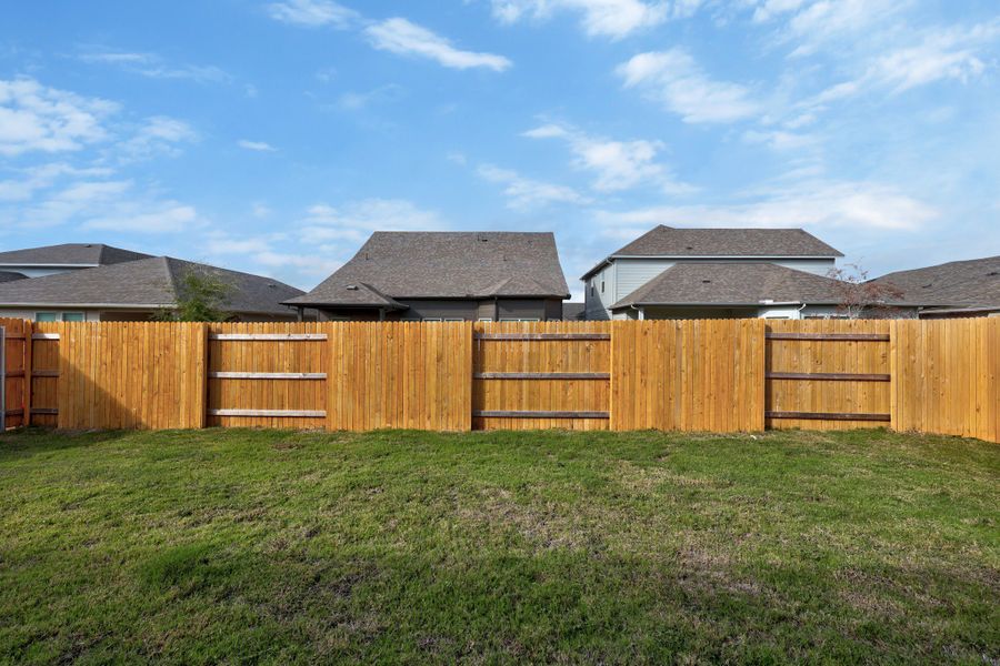 Exterior details and patio area of a home in Prairie Winds, Hutto (Image 22).