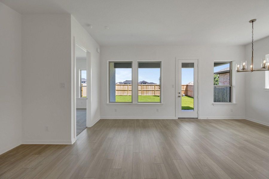Spacious, unfurnished interior of a new home in Meridiana - Terrace Collection, Manvel (Image 13).