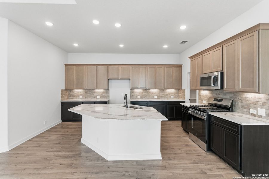 Furnished interior view inside a new home in The Crossvine – Garden Homes, Schertz (Image 9).