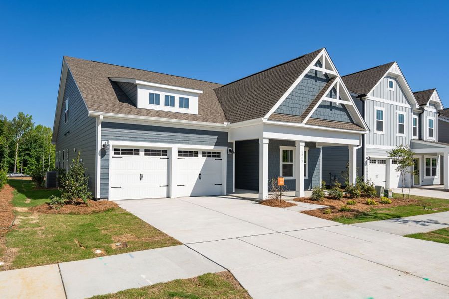 Front exterior of a new home in Parc Northwest, Elon, NC, highlighting curb appeal (Image 2). Front exterior of a new home in Parc Northwest, Elon, NC, highlighting curb appeal (Image 2).