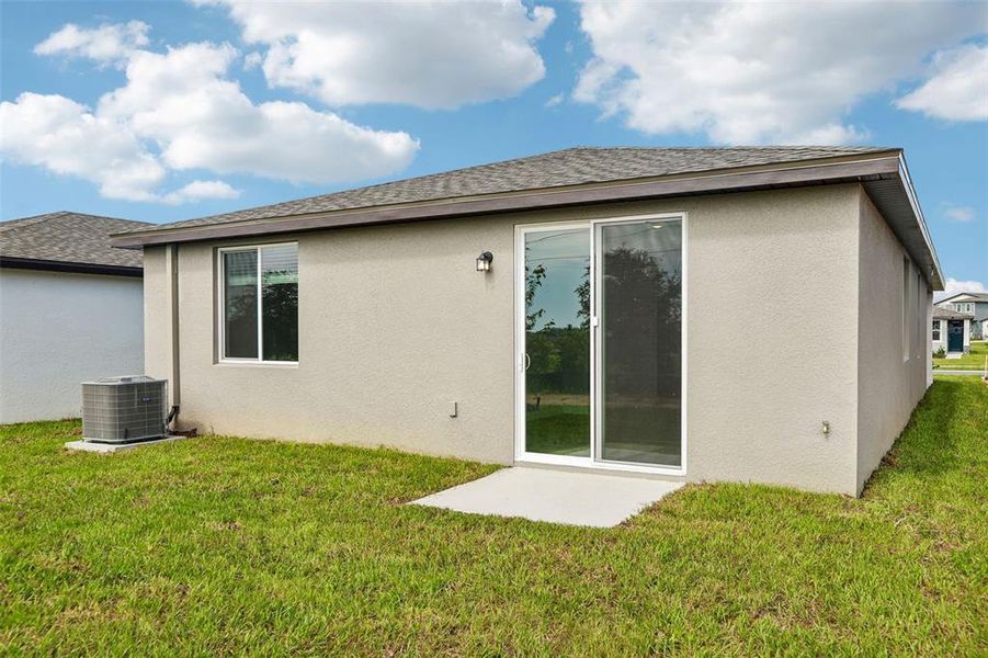 Exterior details and patio area of a home in Benton Hills - Premier Series, Brooksville (Image 3).