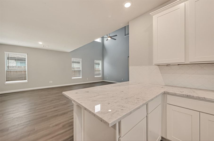 Furnished interior view inside a new home in Sunterra, Katy (Image 11).