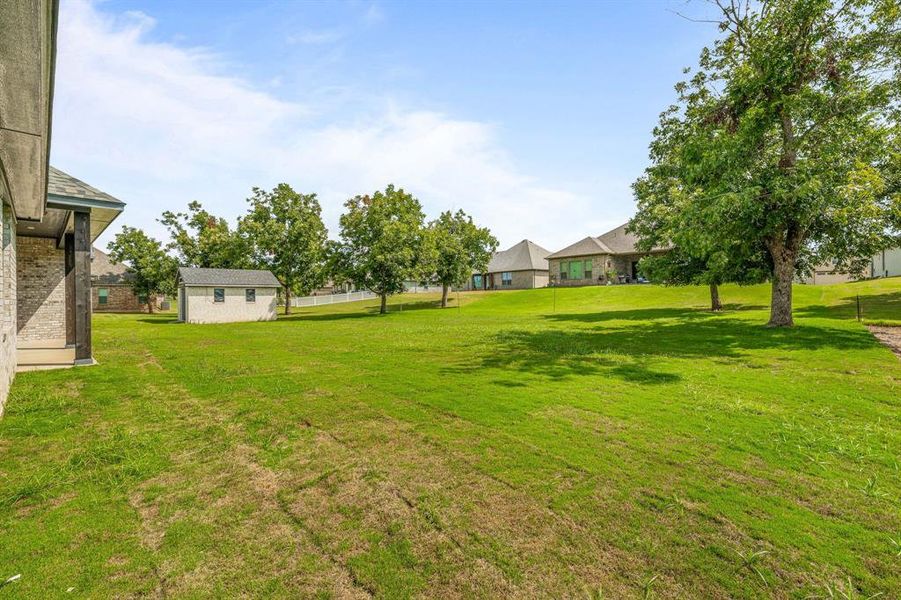 Exterior details and patio area of a home in Pecan Plantation, Granbury (Image 4).