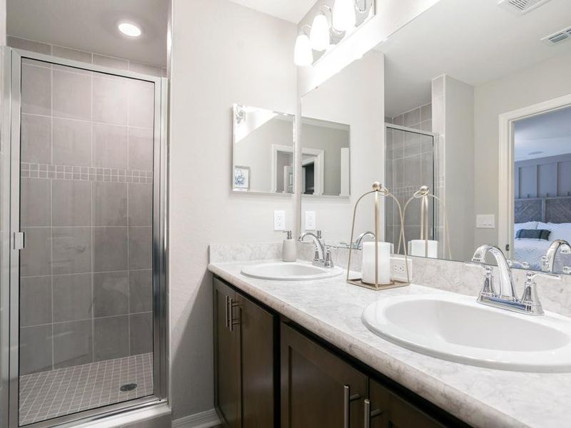 Your suite is complete with a large en-suite bath - Magnolia townhome by Highland Homes