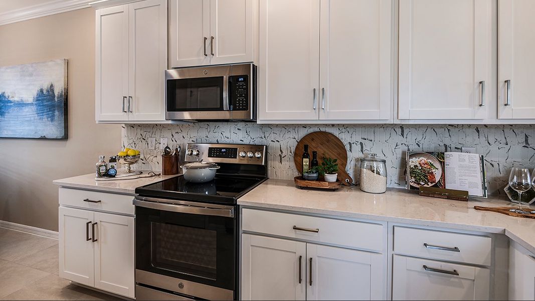 Representative furnished interior of a home built from the Avanti VII by Taylor Morrison in Esplanade at Rivergrass Condos, Naples (Image 5).