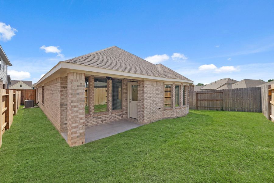 Exterior details and patio area of a home in The Trails, New Caney (Image 2). Exterior details and patio area of a home in The Trails, New Caney (Image 2).