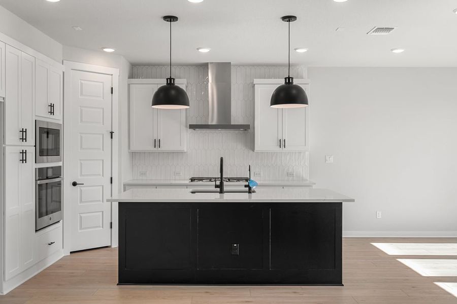 Furnished interior view inside a new home in Terrace Collection at Lariat, Liberty Hill (Image 7). Furnished interior view inside a new home in Terrace Collection at Lariat, Liberty Hill (Image 7).