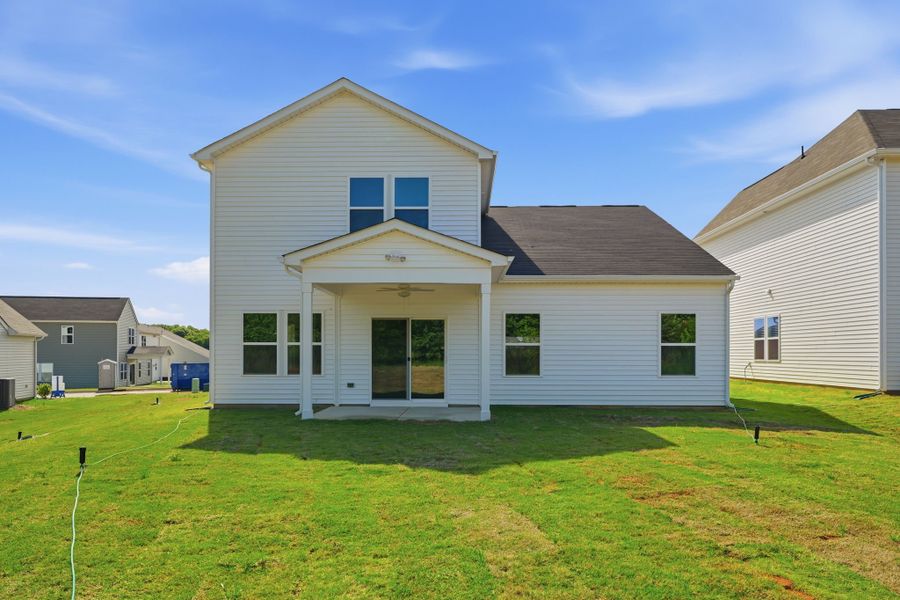 Exterior details and patio area of a home in Piper Creek, Newton (Image 4).