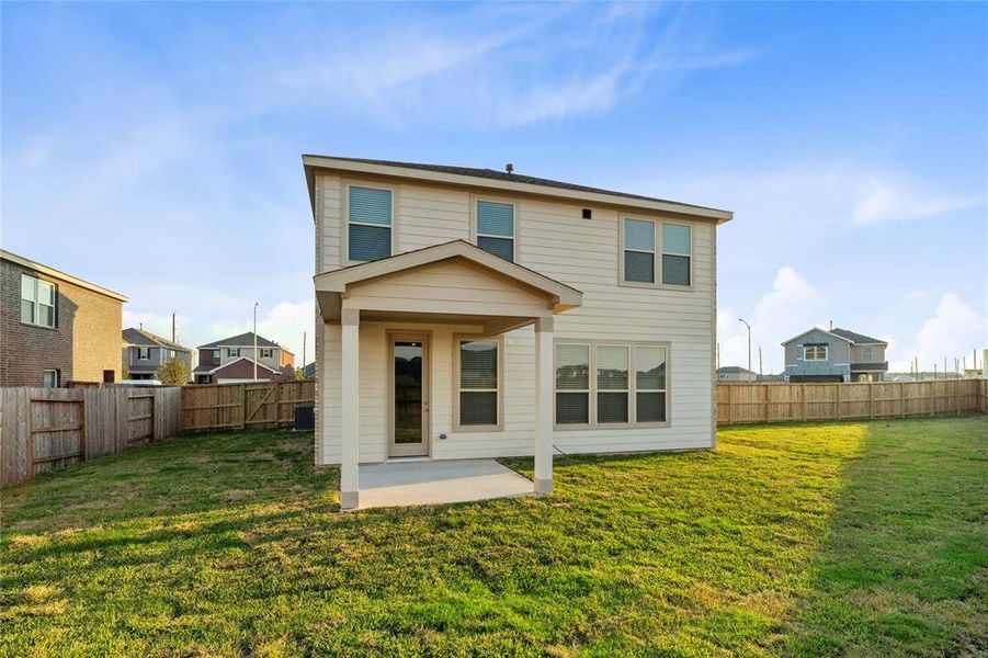 This backyard is enjoyable for everyone! From pets playing, kids jumping on the trampoline, or even having a garden, this amazing backyard provides space for endless activities for the whole family!