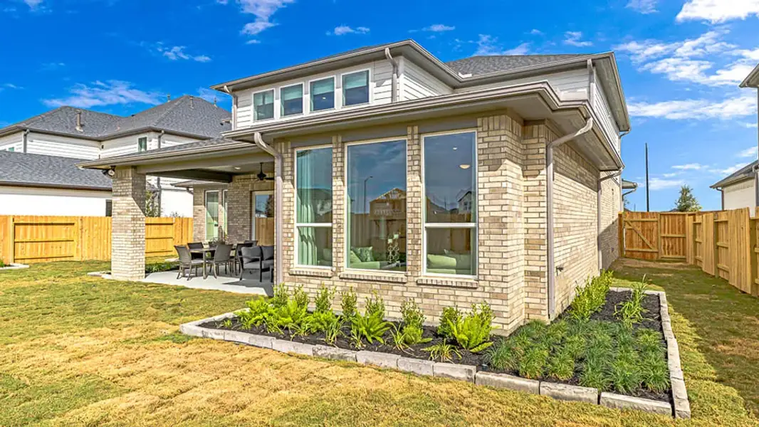 Exterior details and patio area of a home in Avalon at Cypress, Cypress (Image 22).