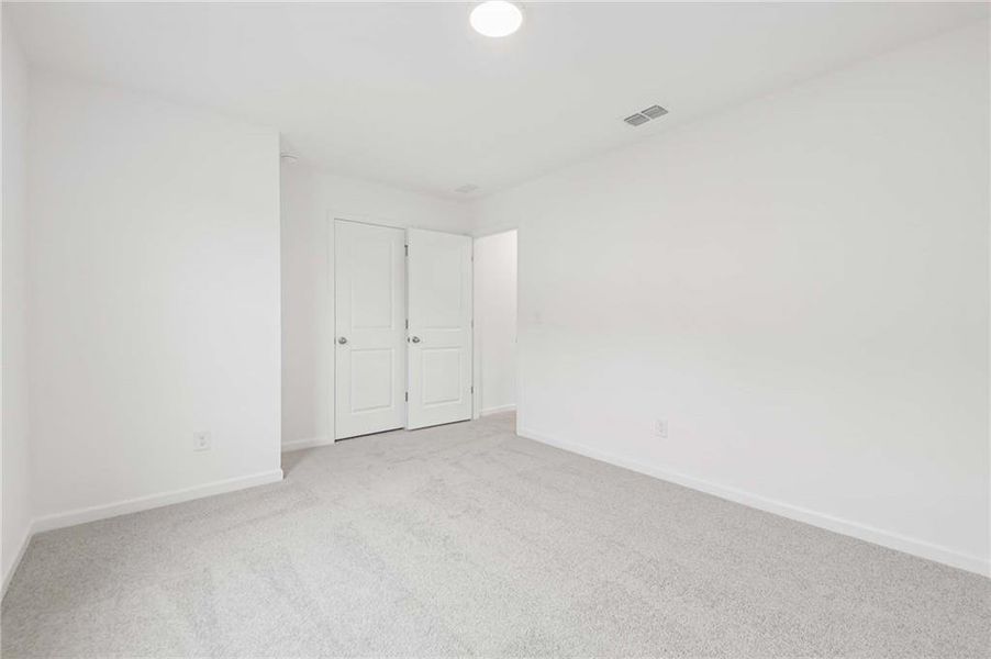 Spacious, unfurnished interior of a new home in The Pointe at Heron Bay, Locust Grove (Image 24).