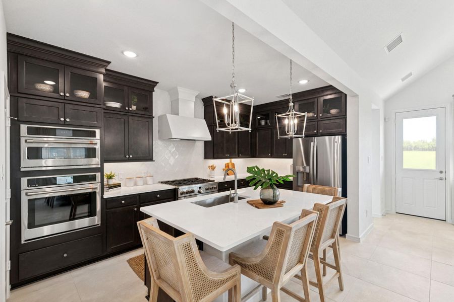 Stunning island kitchen (*Photo not of actual home and used for illustration purposes only.)