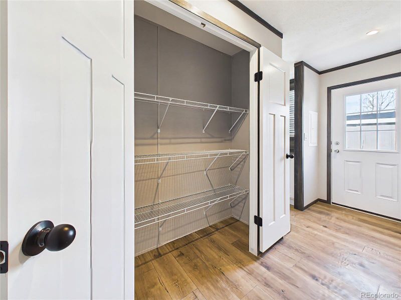 Storage Closet – Additional closet space with built-in shelving, ideal for linens, pantry overflow, or household items.