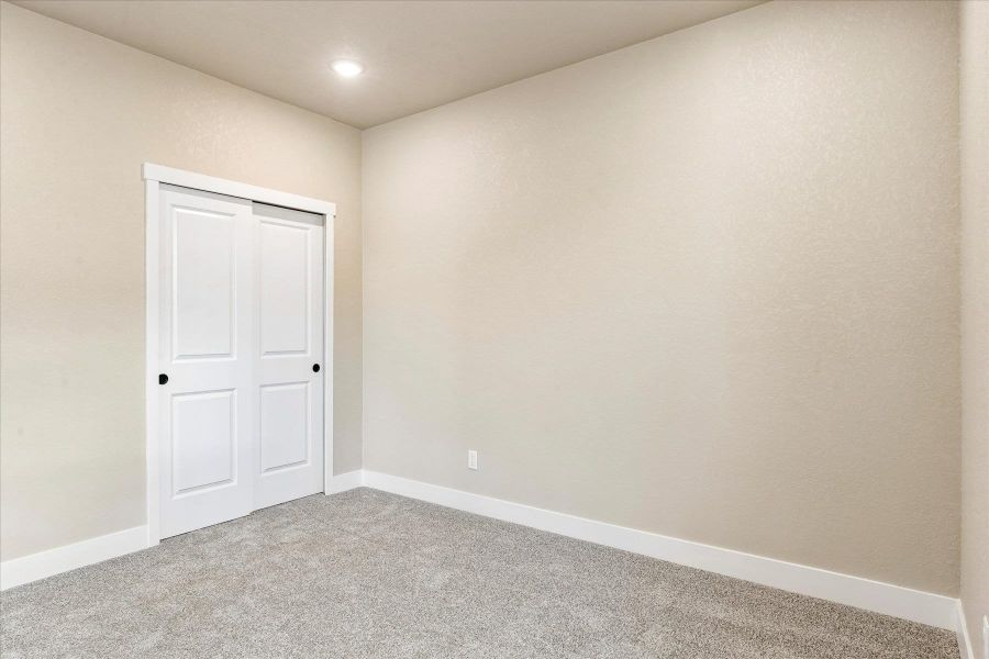 Spacious, unfurnished interior of a new home in The Glen-12, Colorado Springs (Image 22).