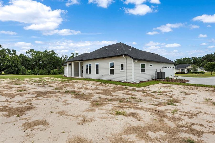 Exterior details and patio area of a home in , Lake City (Image 4). Exterior details and patio area of a home in , Lake City (Image 4).