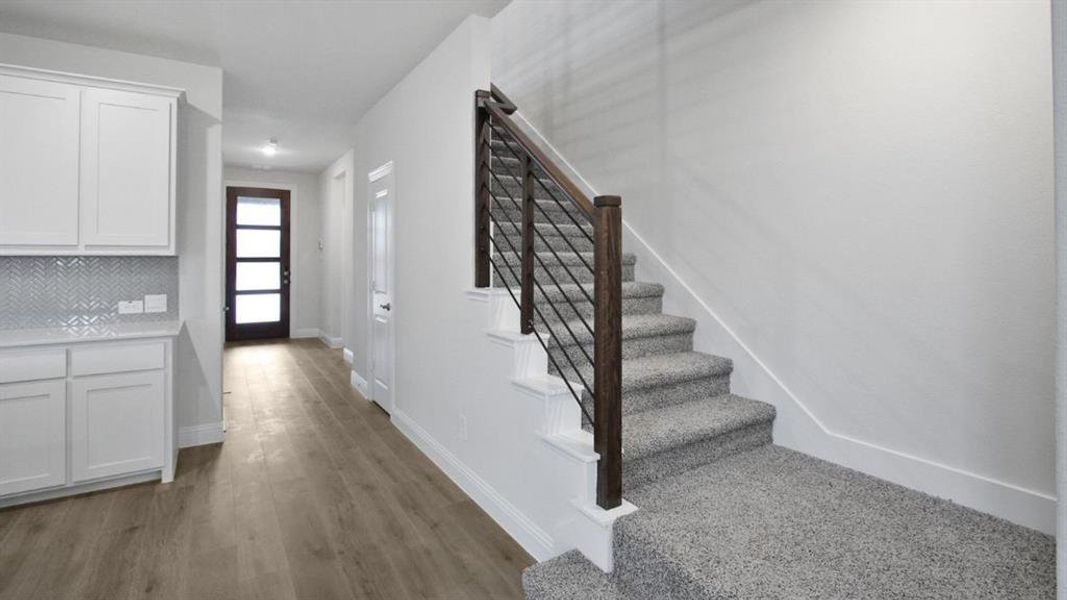 Furnished interior view inside a new home in The Landing at Hidden Lakes, McKinney (Image 2). Furnished interior view inside a new home in The Landing at Hidden Lakes, McKinney (Image 2).