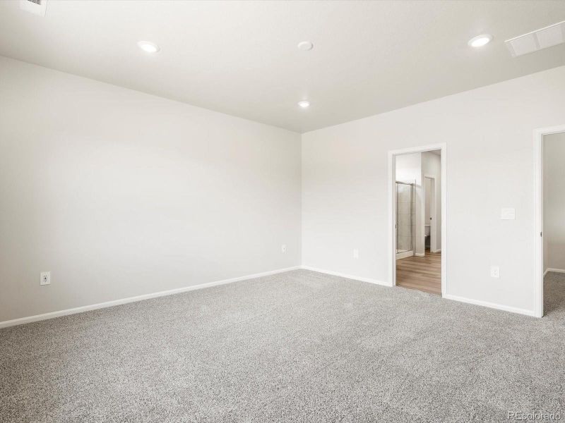 Spacious, unfurnished interior of a new home in Poudre Heights: The Alpine Collection, Windsor (Image 36).