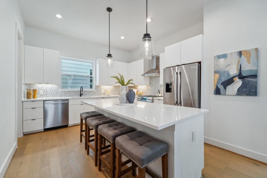 Photos show similar floor plan & alternative finishes from the previous development. Selections may vary.