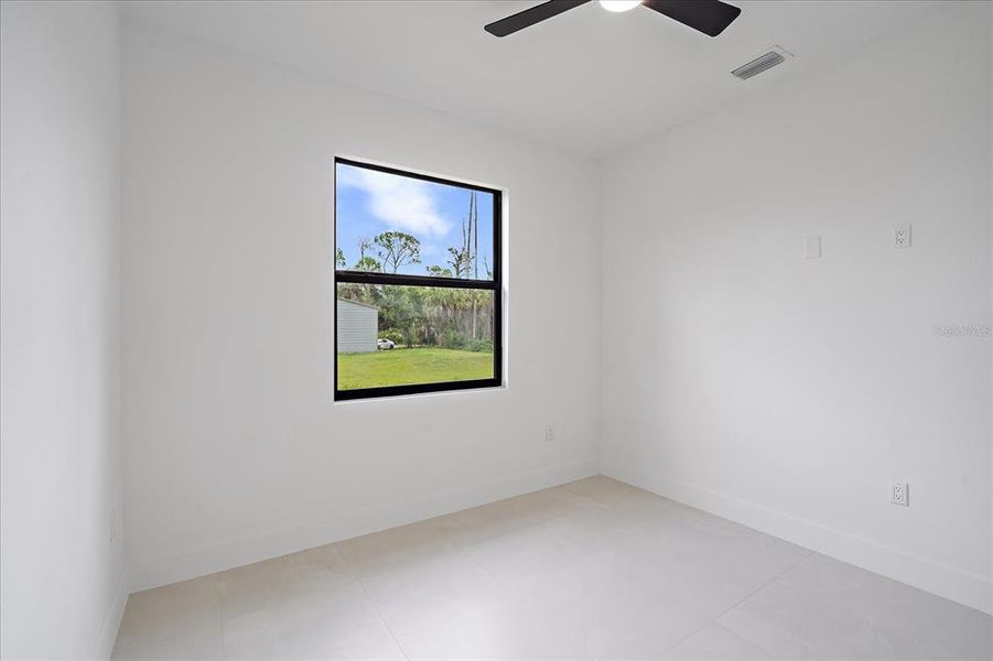 Spacious, unfurnished interior of a new home in , Port Charlotte (Image 26).