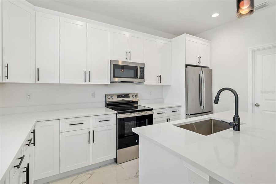 Furnished interior view inside a new home in , Port Charlotte (Image 11).