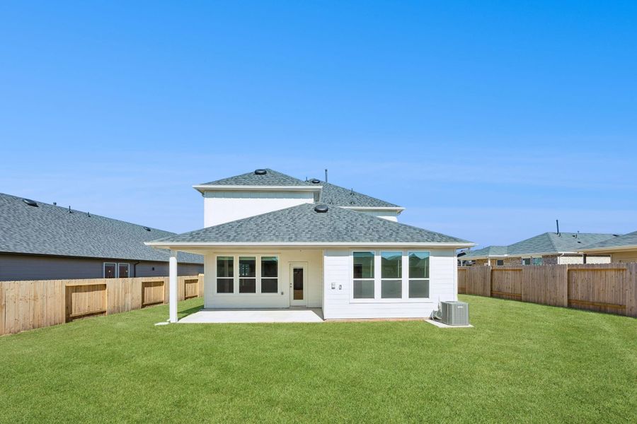 Exterior details and patio area of a home in Montgomery Bend, Montgomery (Image 3).