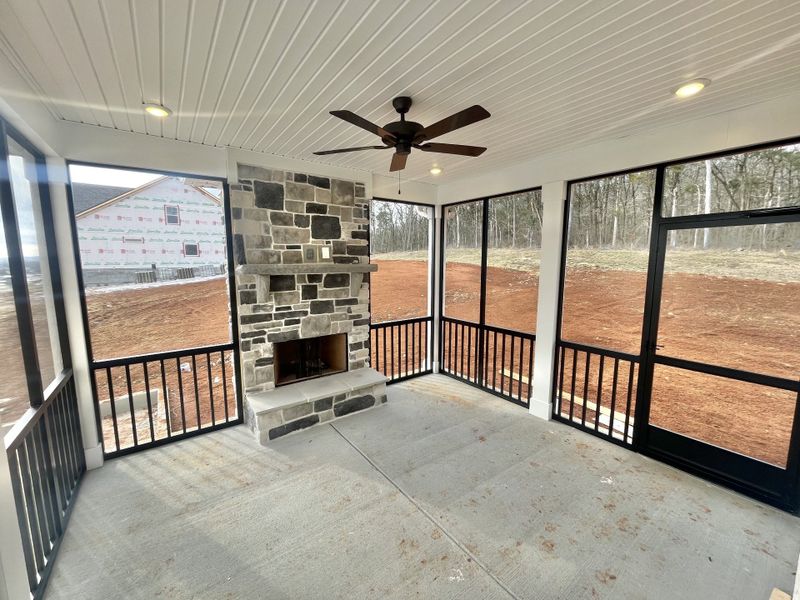 Got to love a fireplace on a screened in back porch