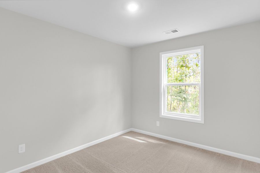 Spacious, unfurnished interior of a new home in Central Creek, Goose Creek (Image 36).
