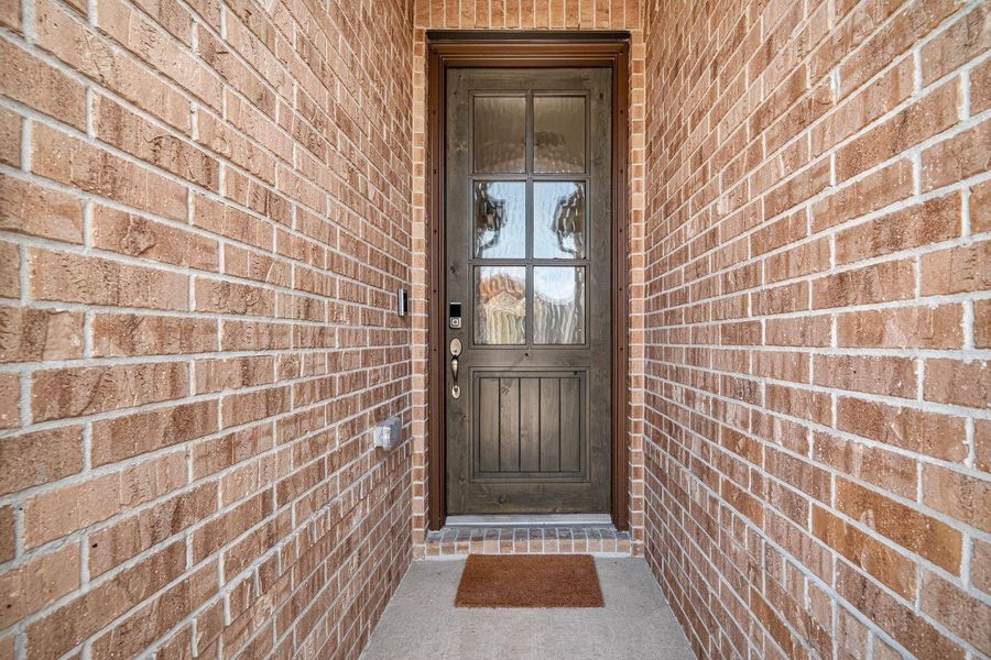 Exterior details and patio area of a home in Pomona, Manvel (Image 22).