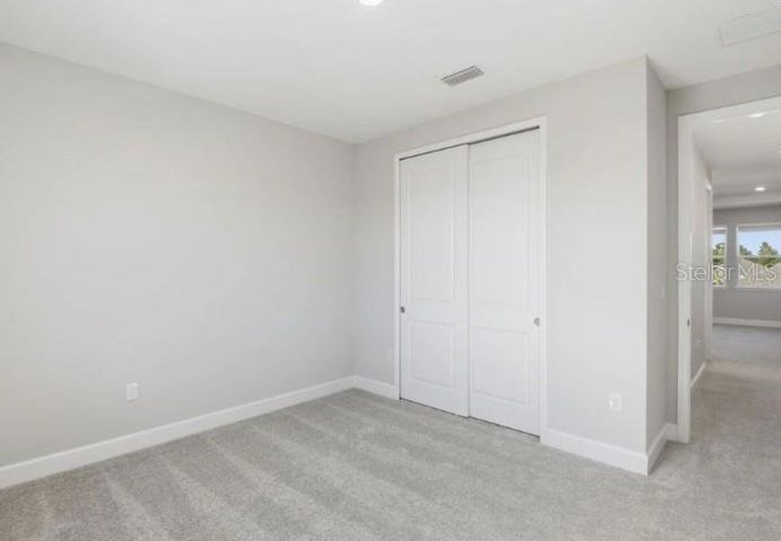 Spacious, unfurnished interior of a new home in Harvest at Ovation, Winter Garden (Image 12).
