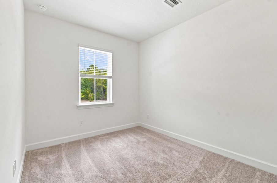 Representative unfurnished interior of a home built from the The Burney by David Weekley Homes in Westerly Park at Wildlight – Overlook Collection, Yulee (Image 9).